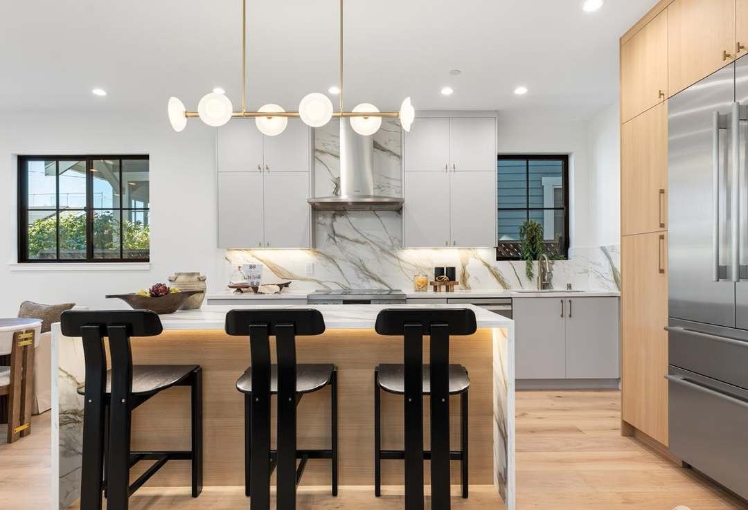 Open kitchen and dining opening to the great room